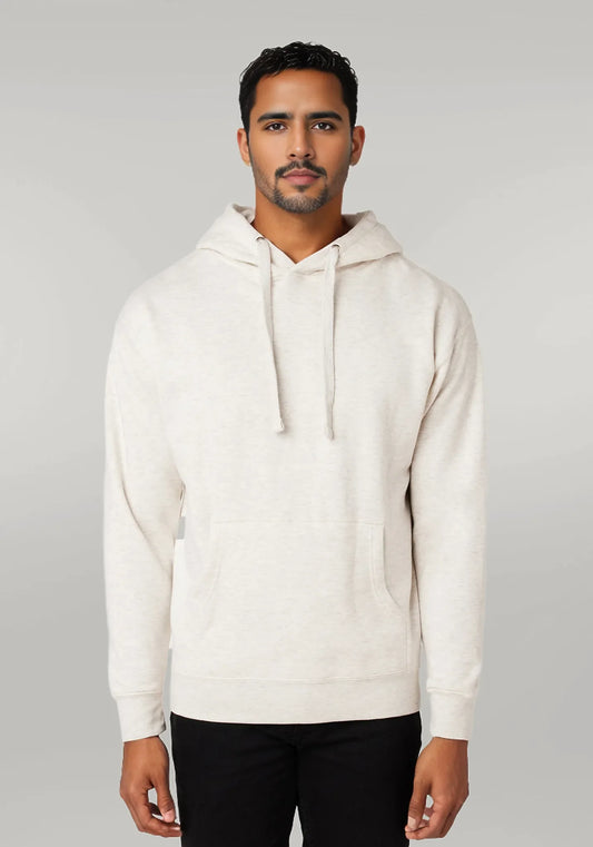 A man wearing a light blue pullover hoodie with a hood and a kangaroo pocket.