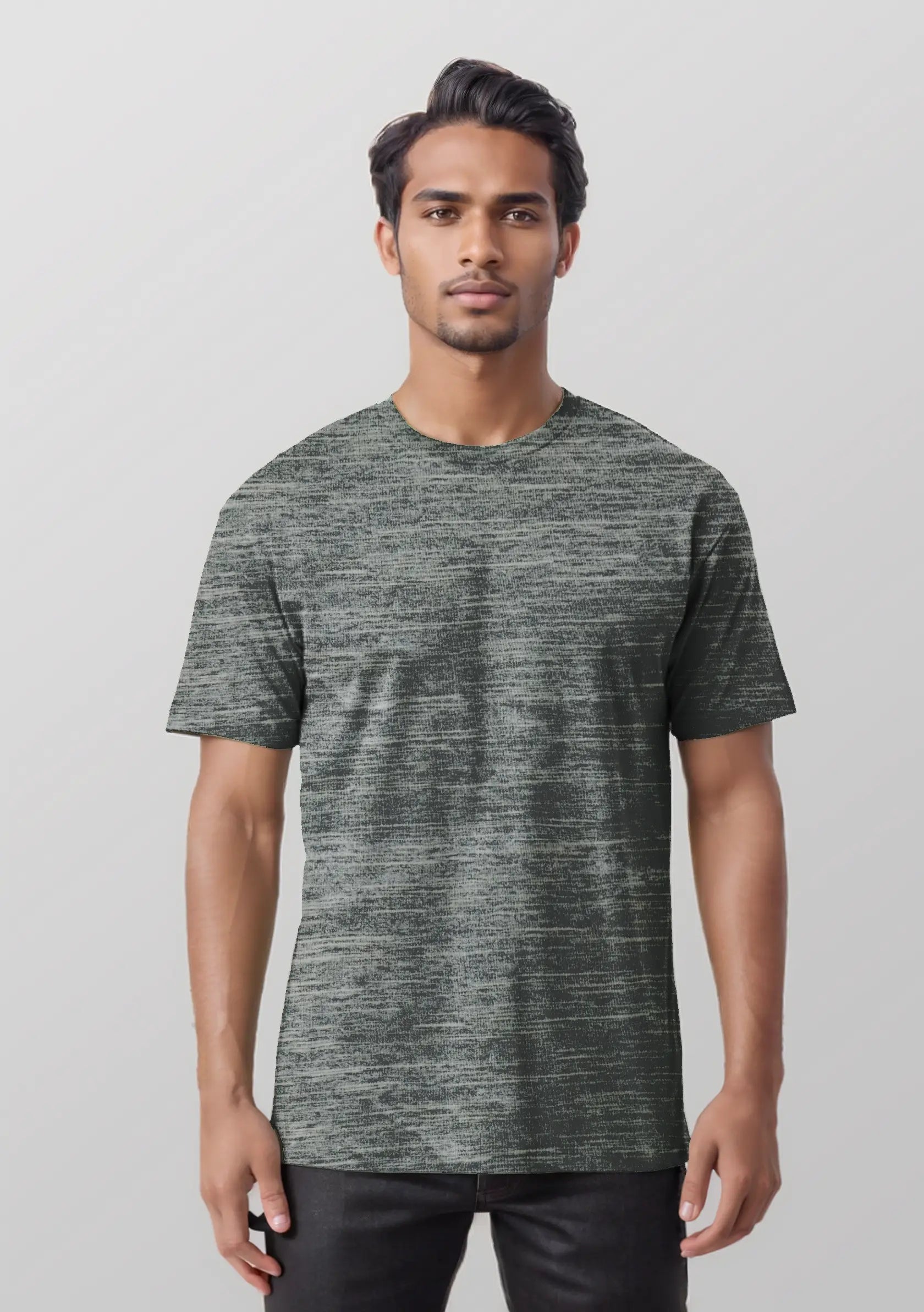 Man wearing a gray t-shirt against a plain background