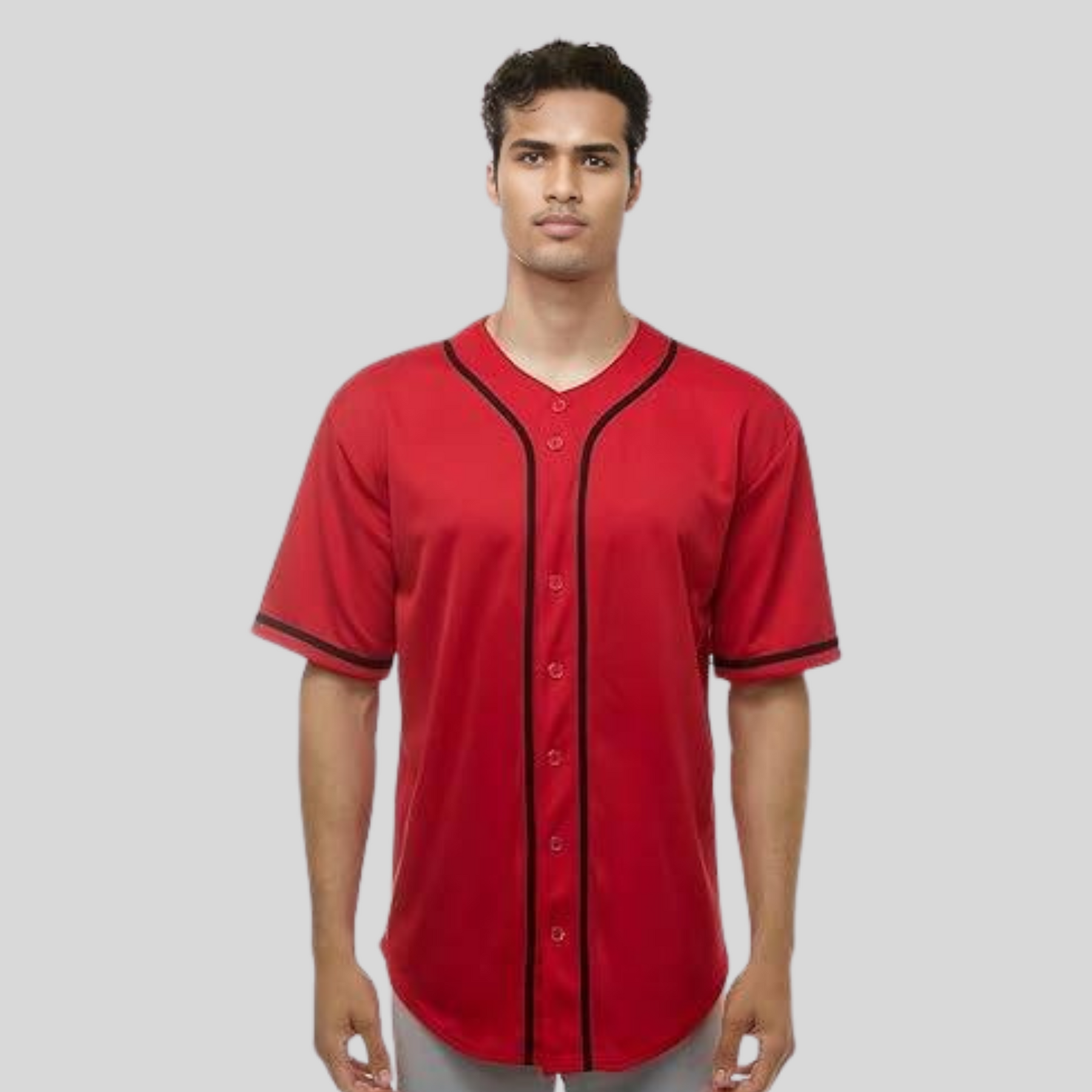 Man wearing a red baseball jersey with black trim on a gray background